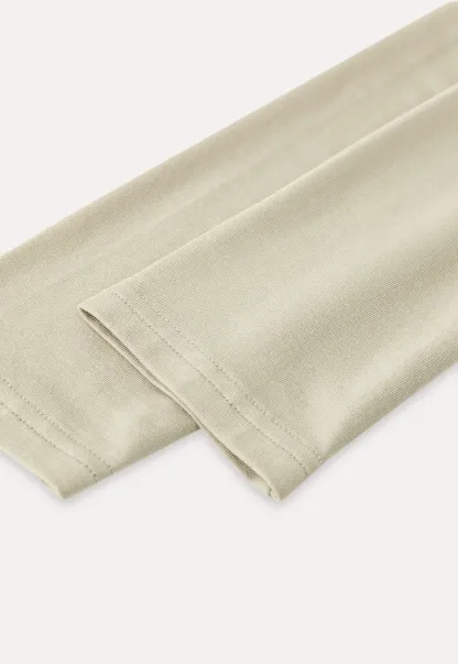 Long sleeve draped neckline top with square cutout