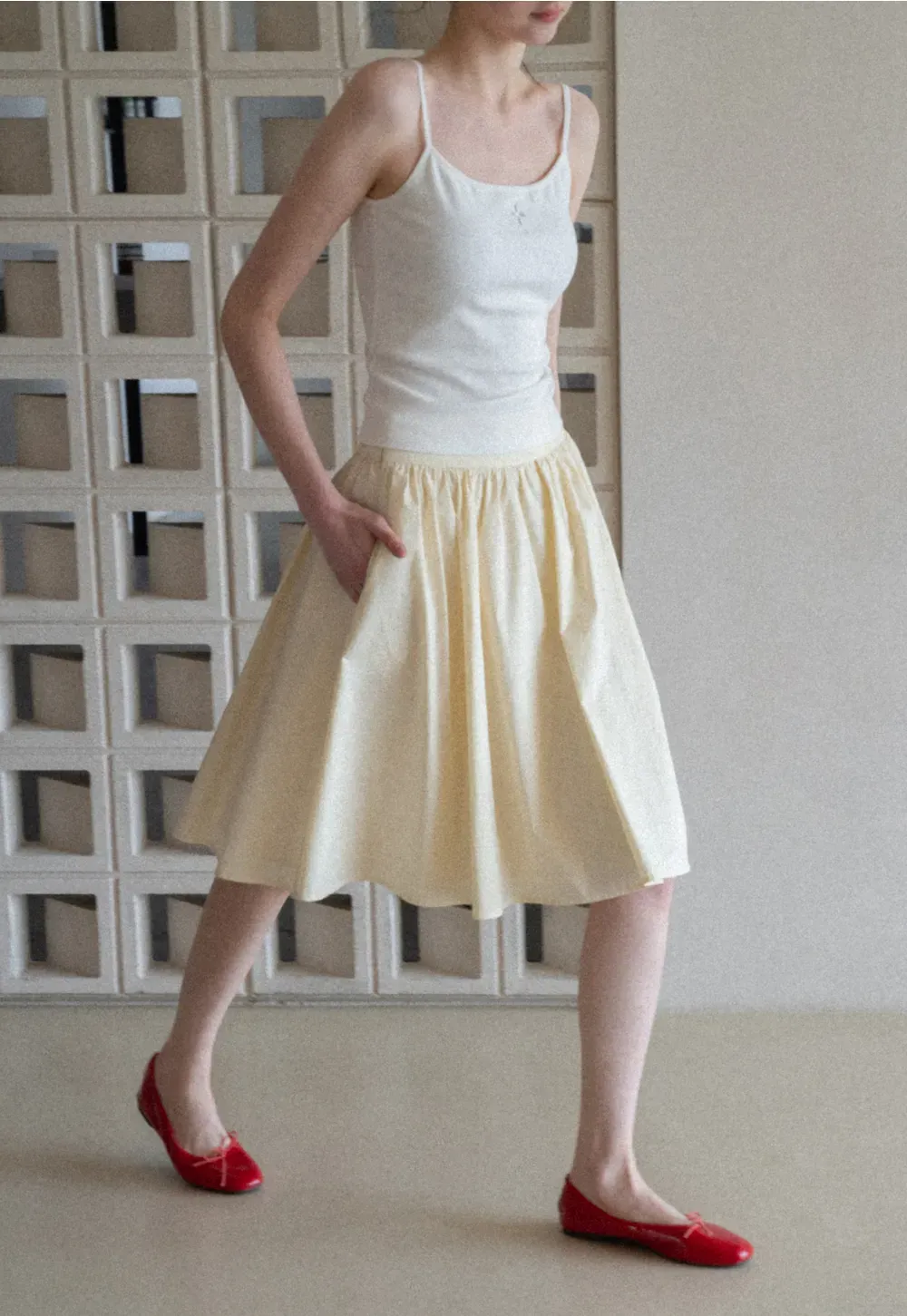 A-line pleated midi skirt with waistband