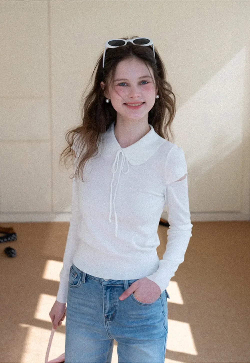 Elegant Knit Sweater with Bow Detail and Cutout Sleeves