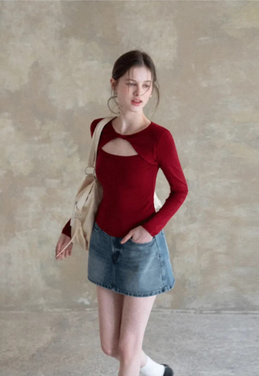 Long sleeve top with front cutout detail