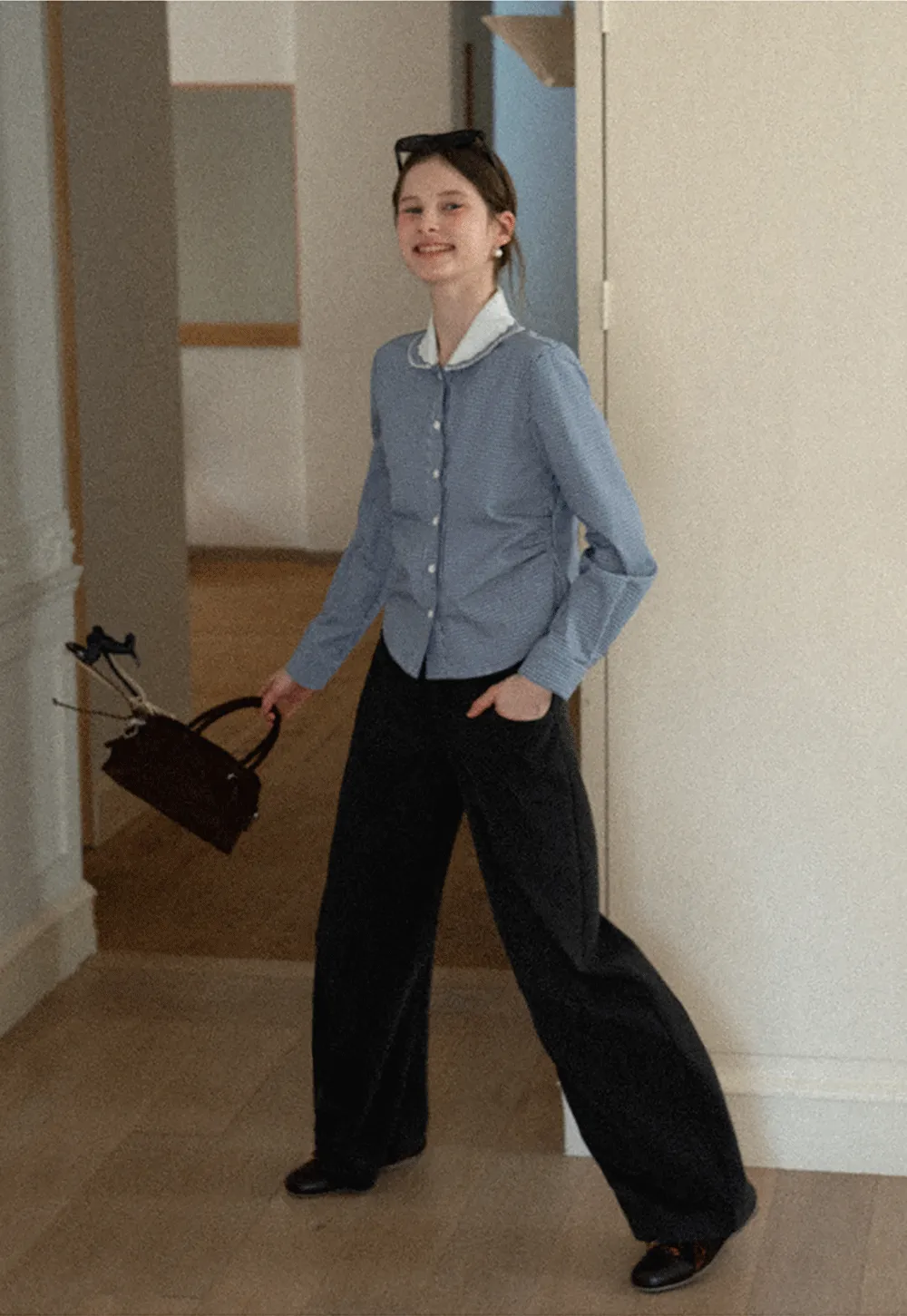 Elegant blouse with scalloped collar and long sleeves for versatile styling