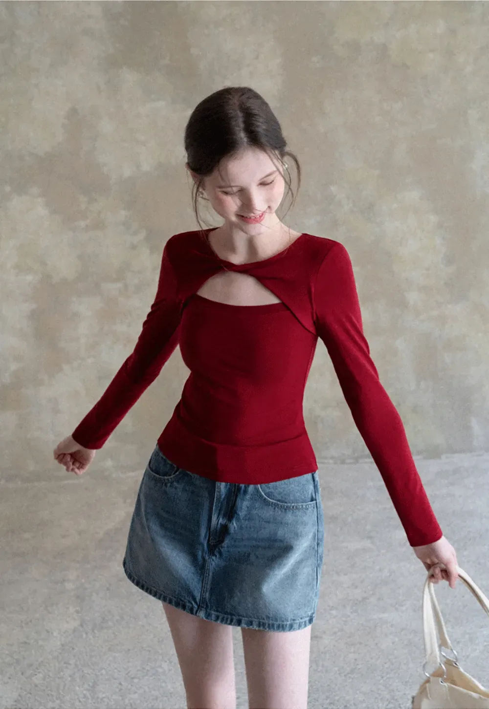 Long sleeve top with front cutout detail