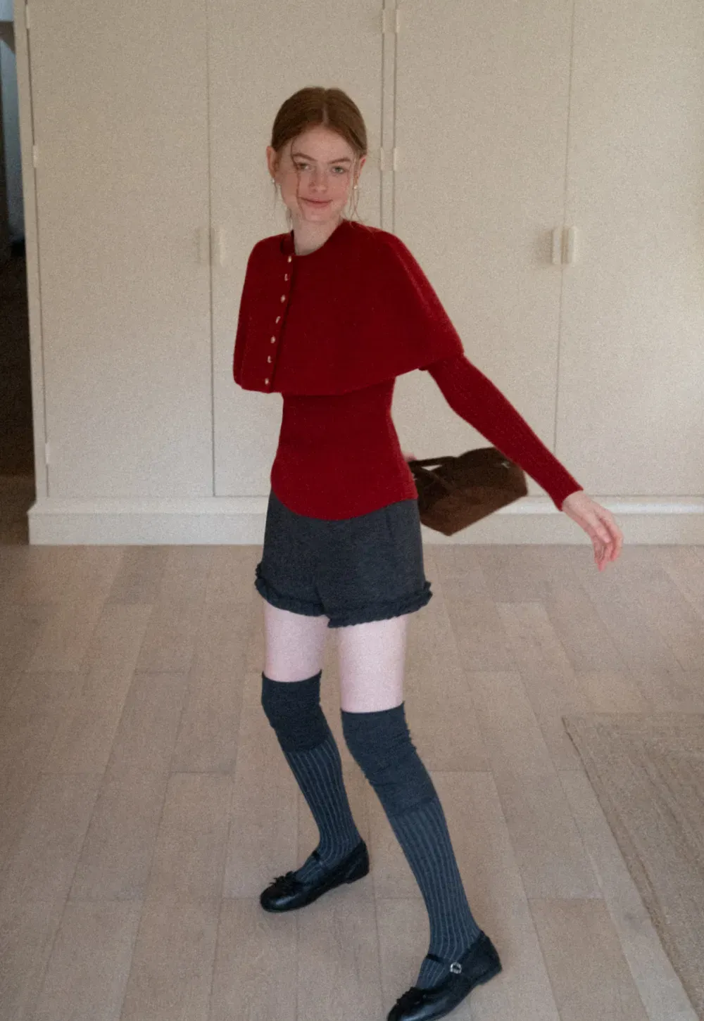 High waist shorts with ruffle hem and belt design