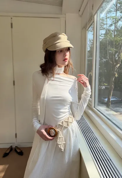 Elegant asymmetrical long sleeve dress with unique belt design