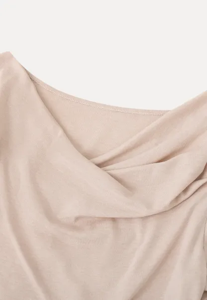 Long sleeve top with ruffled hem and cuffs