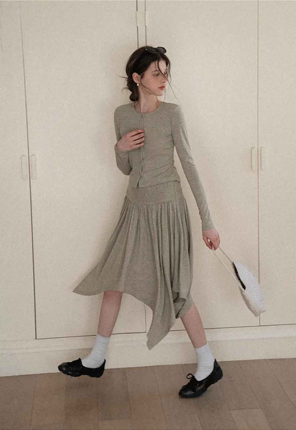 Long sleeve button front top and asymmetrical skirt