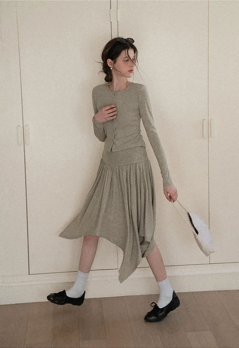 Long sleeve button front top and asymmetrical skirt