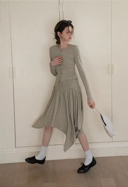 Long sleeve button front top and asymmetrical skirt