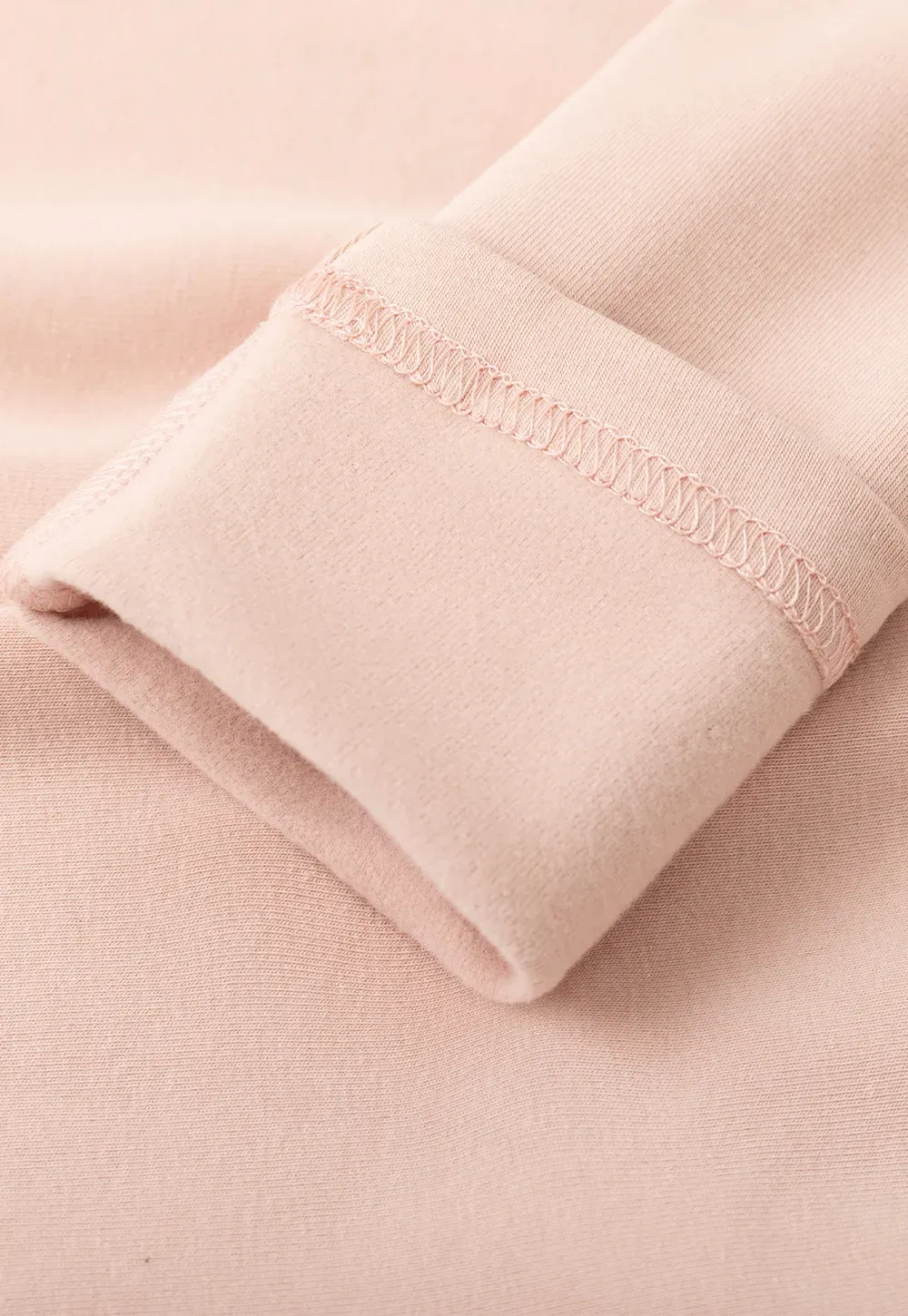 V neck long sleeve top with lace trim and fitted design