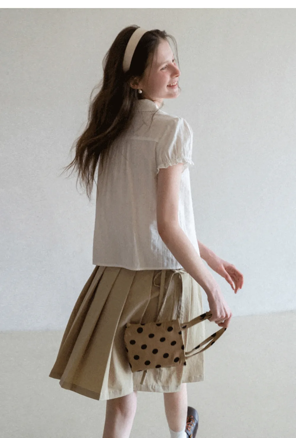Pleated skirt with side tie waistband