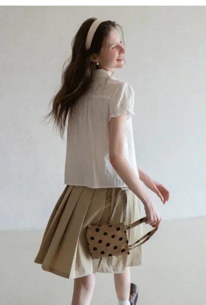 Pleated skirt with side tie waistband