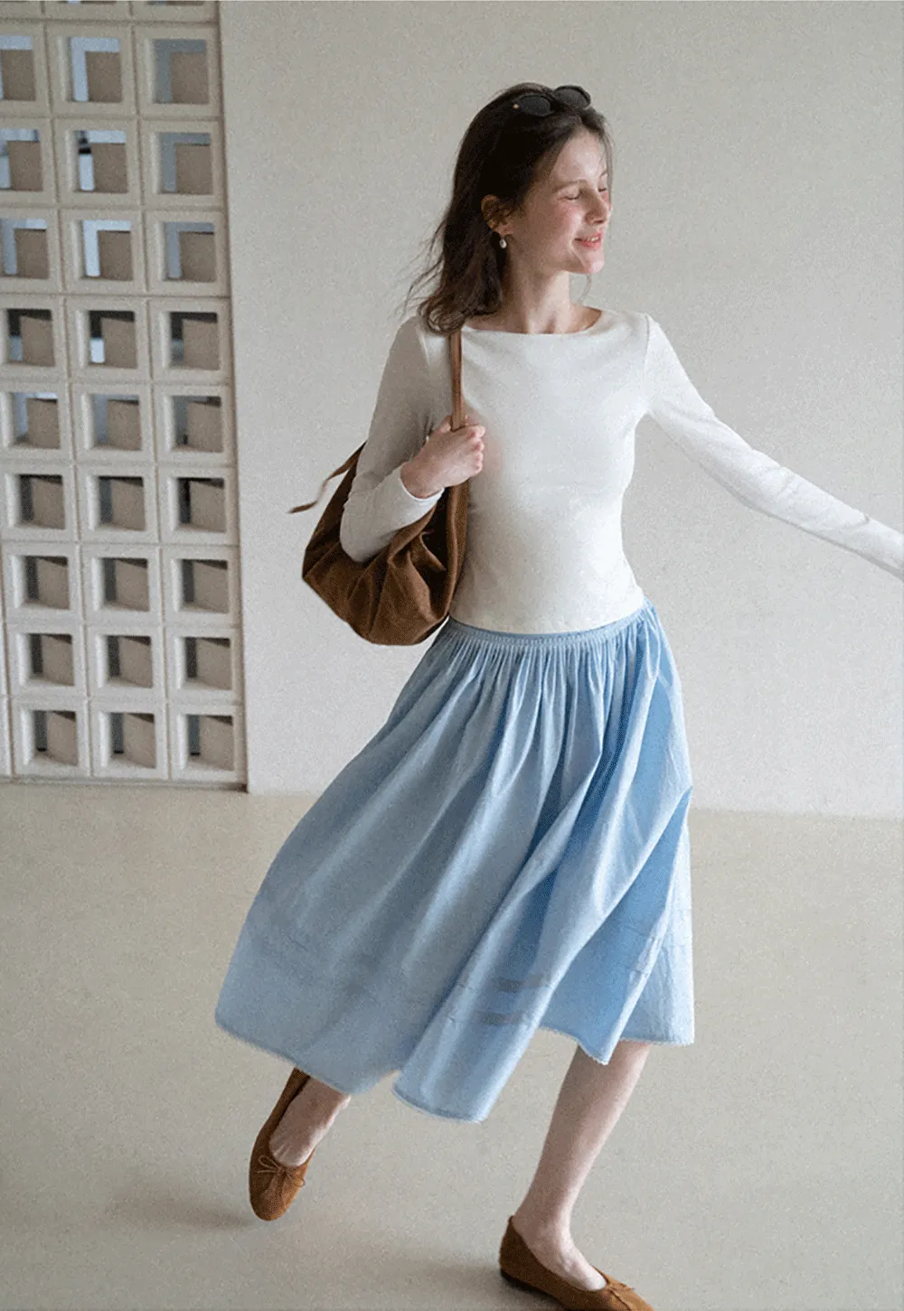 Lightweight pleated midi skirt with elastic waist