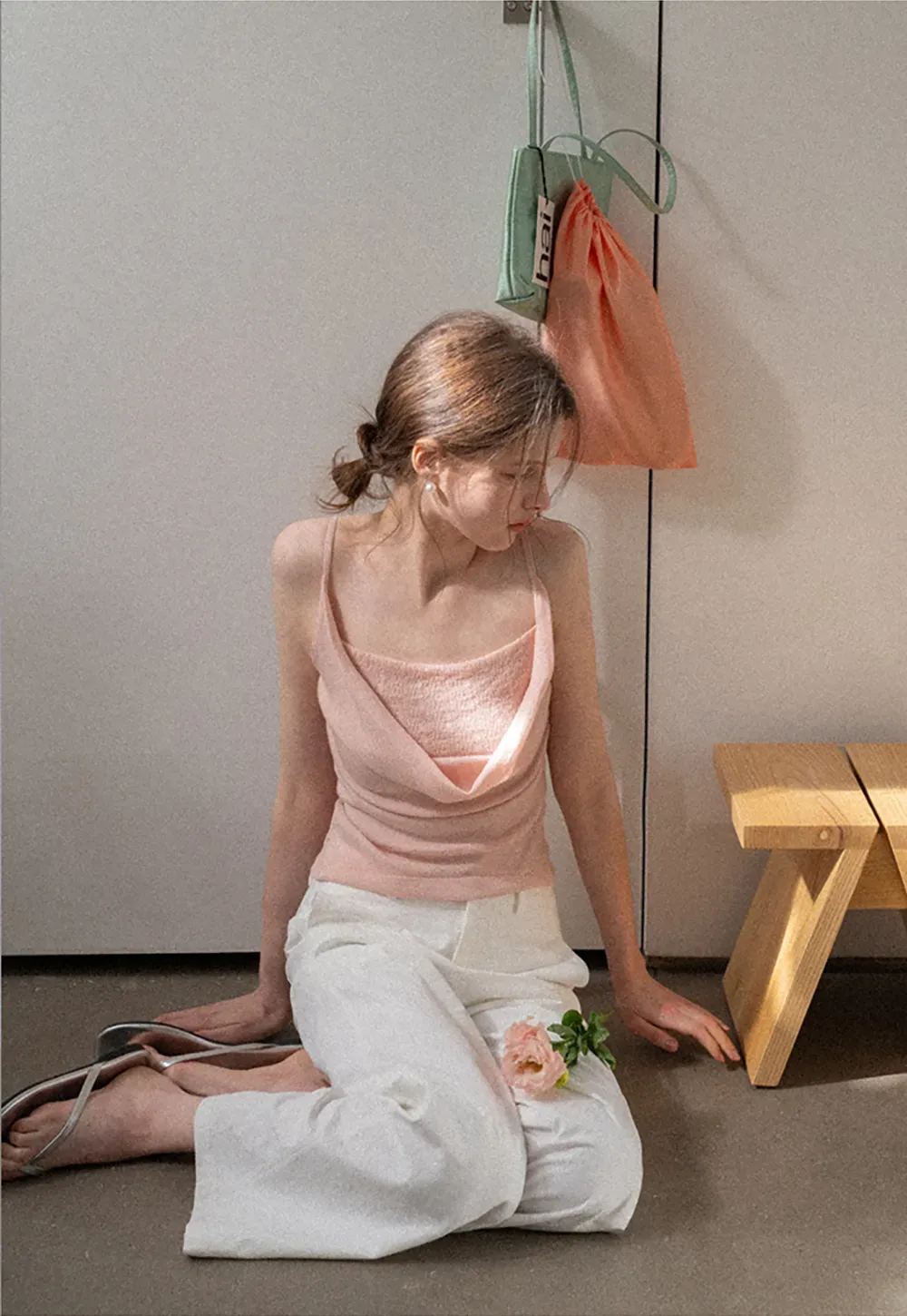 Silk-like tank top with thin straps and draped neckline