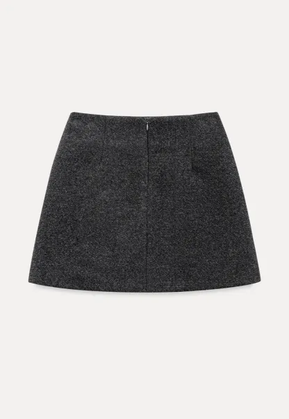 A-line mini skirt with textured fabric and central seam design