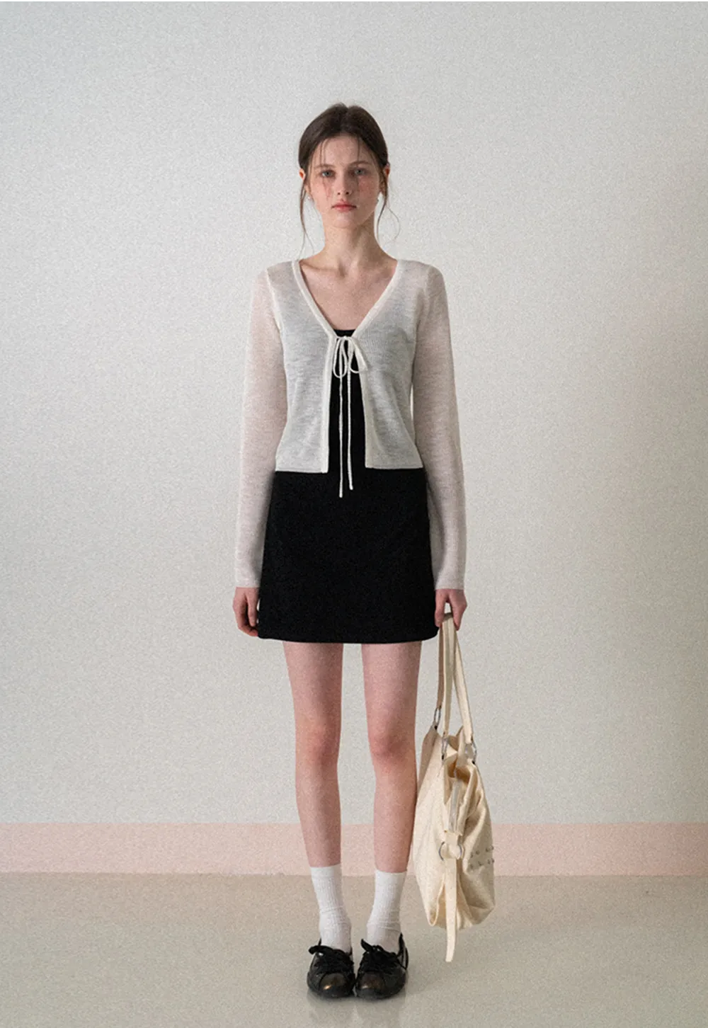 Sleeveless fitted mini dress with thin straps