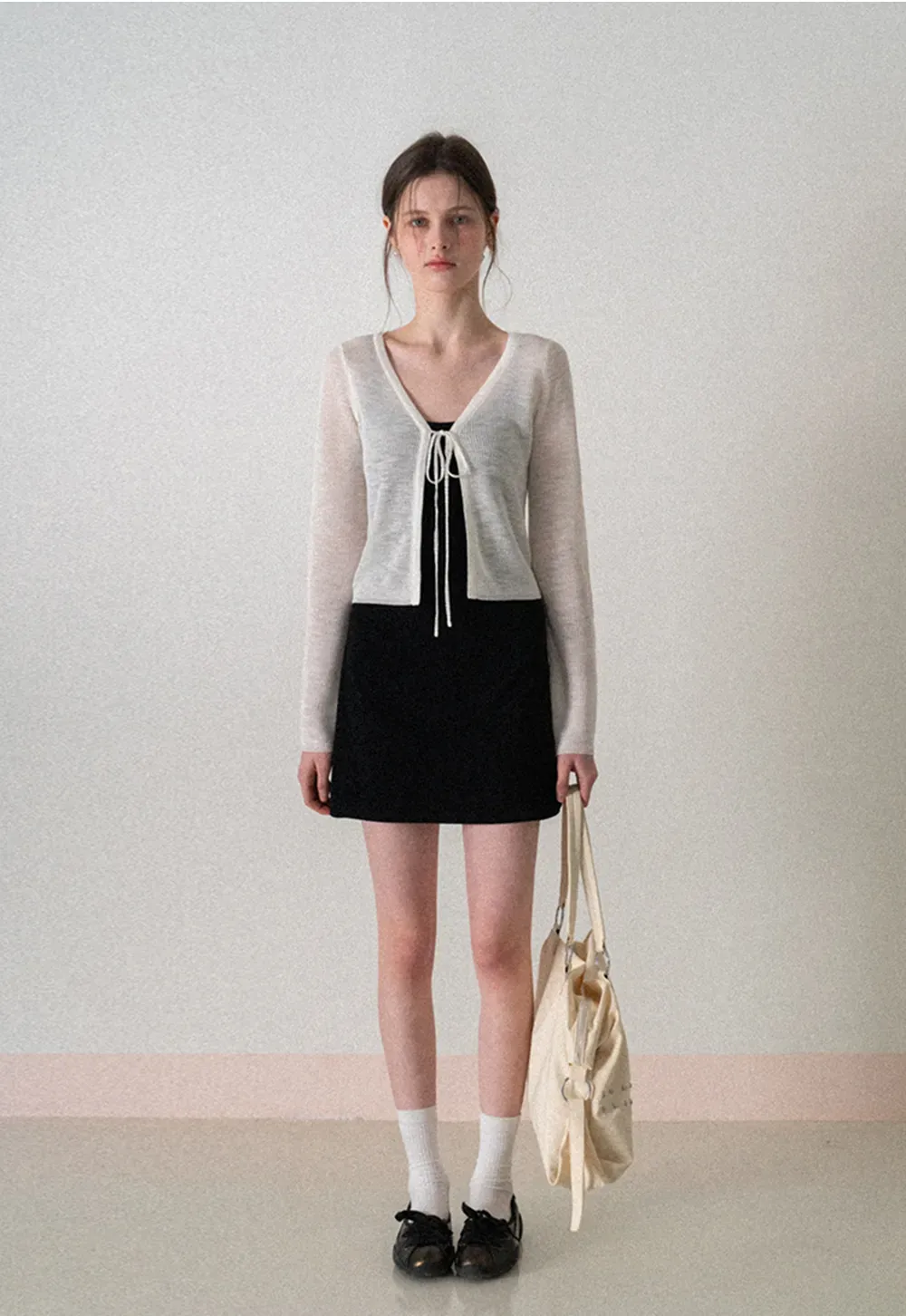 Sleeveless fitted mini dress with thin straps