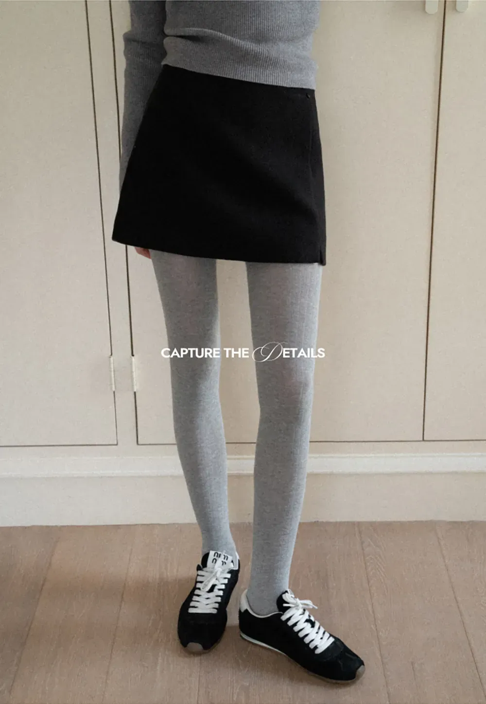 A-line mini skirt with textured fabric and central seam design