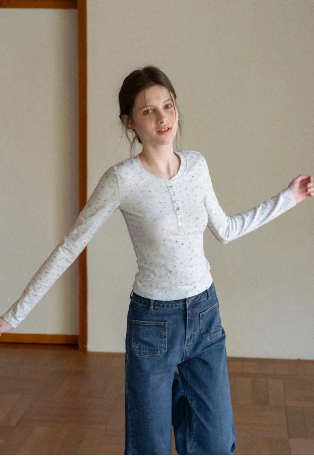 Long sleeve button front top with floral print