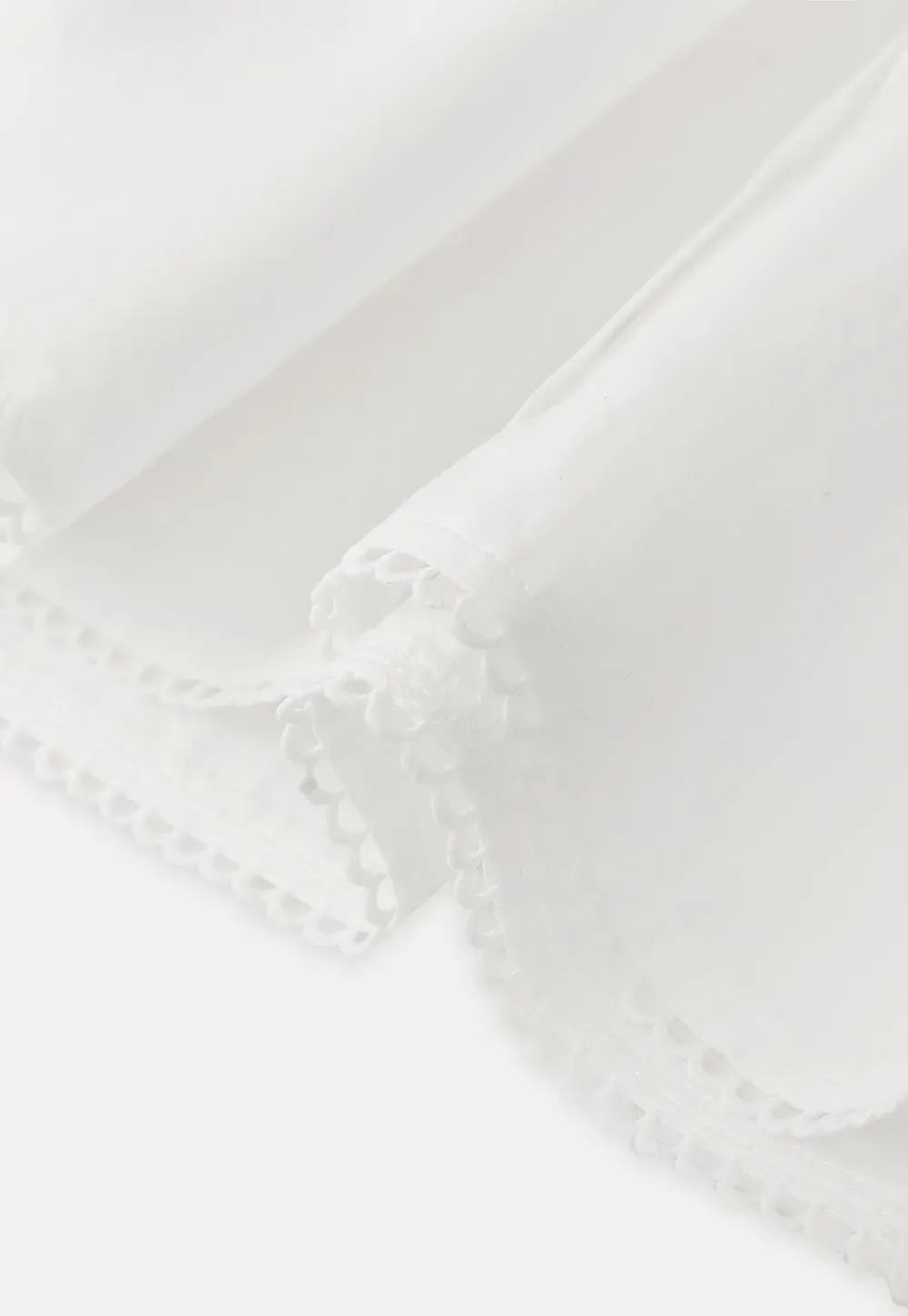 Long sleeve button front shirt with scalloped hem