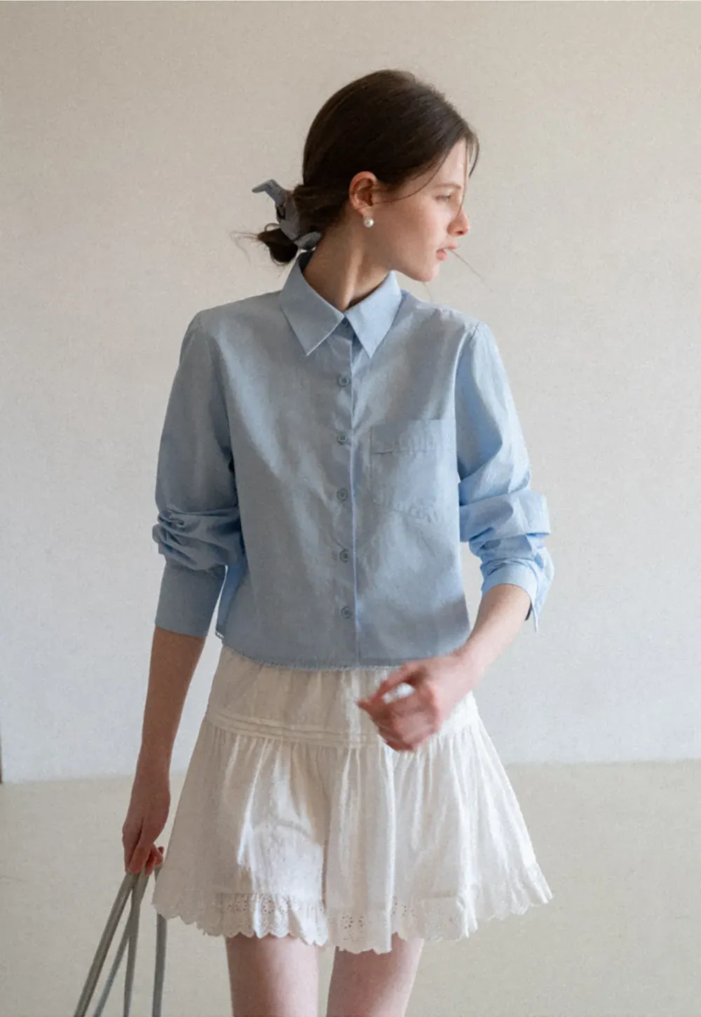Long sleeve button front shirt with scalloped hem
