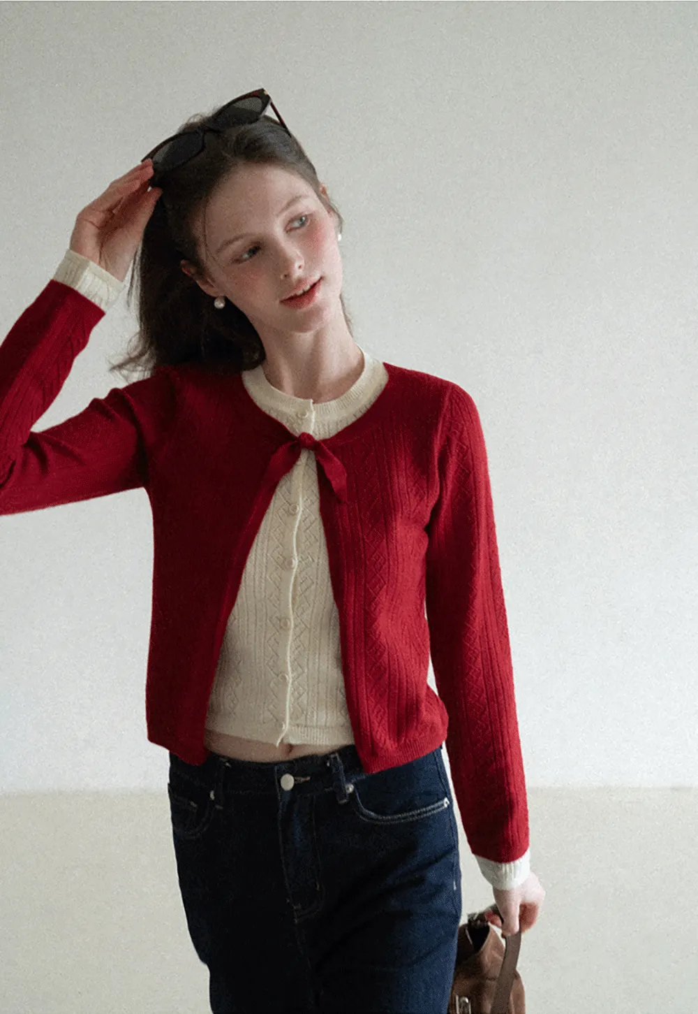 Elegant Knit Cardigan with Bow Detail and Ribbed Texture