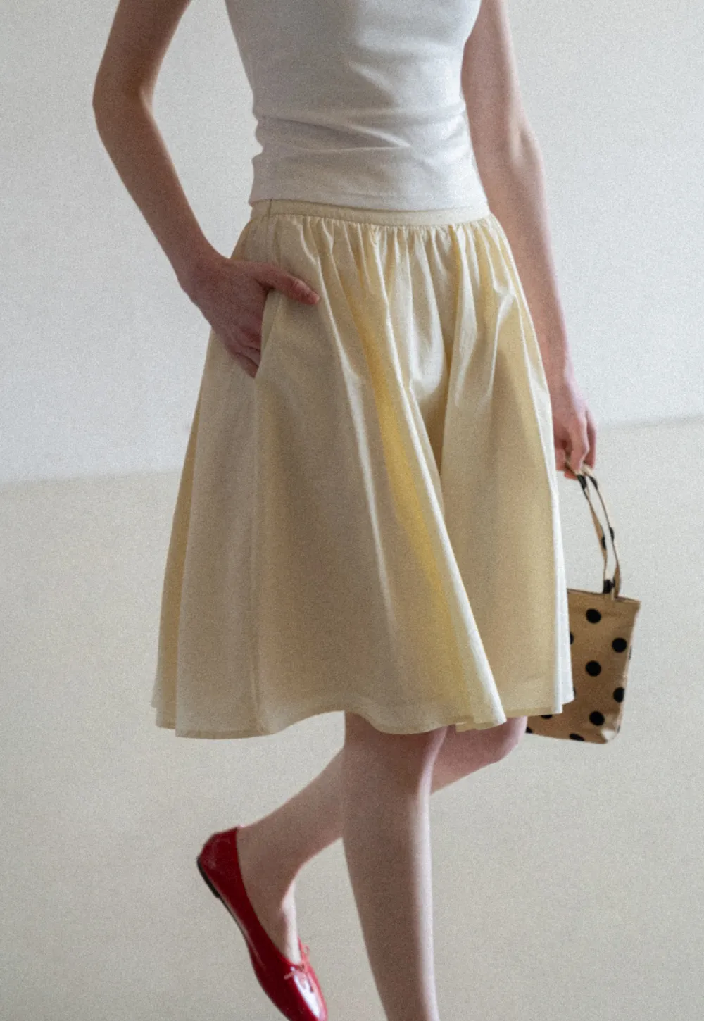 A-line pleated midi skirt with waistband