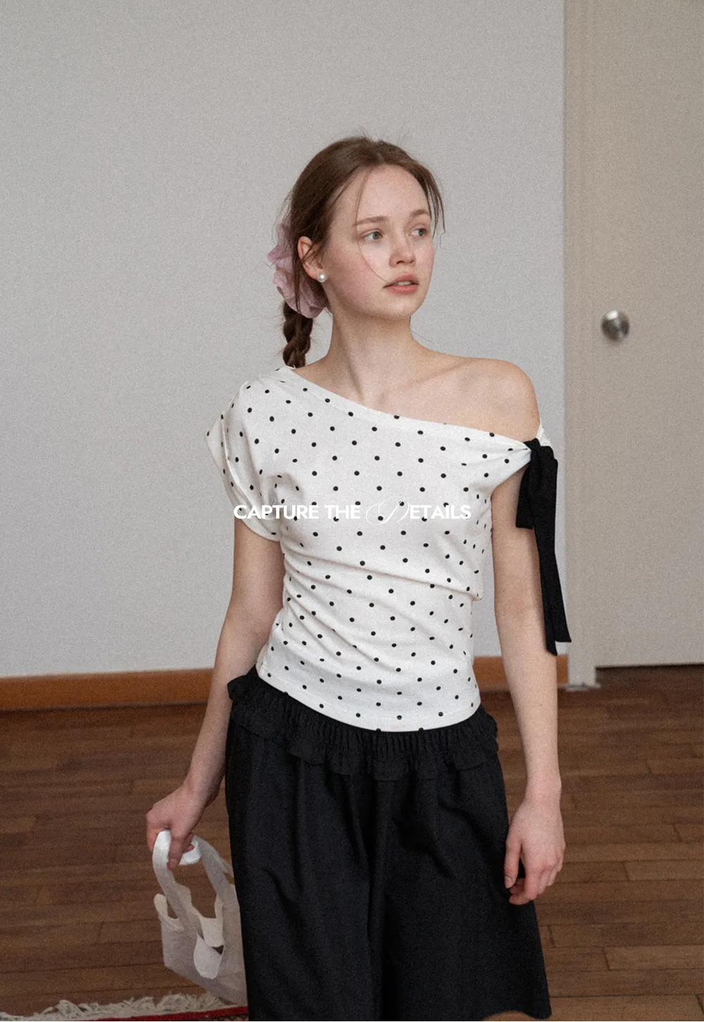 Polka dot one shoulder top with bow detail