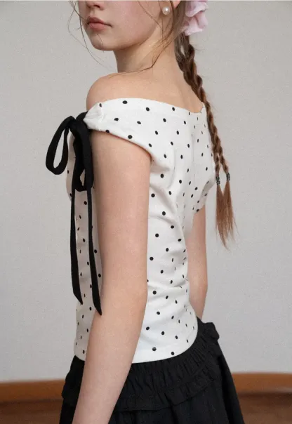 Polka dot one shoulder top with bow detail