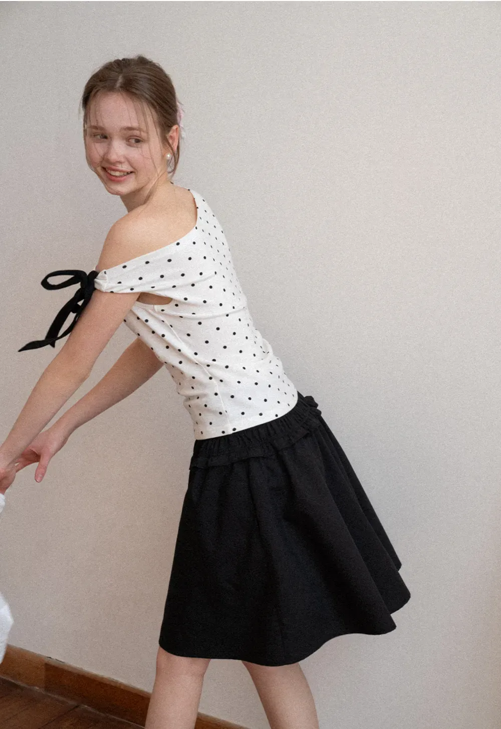 Polka dot one shoulder top with bow detail