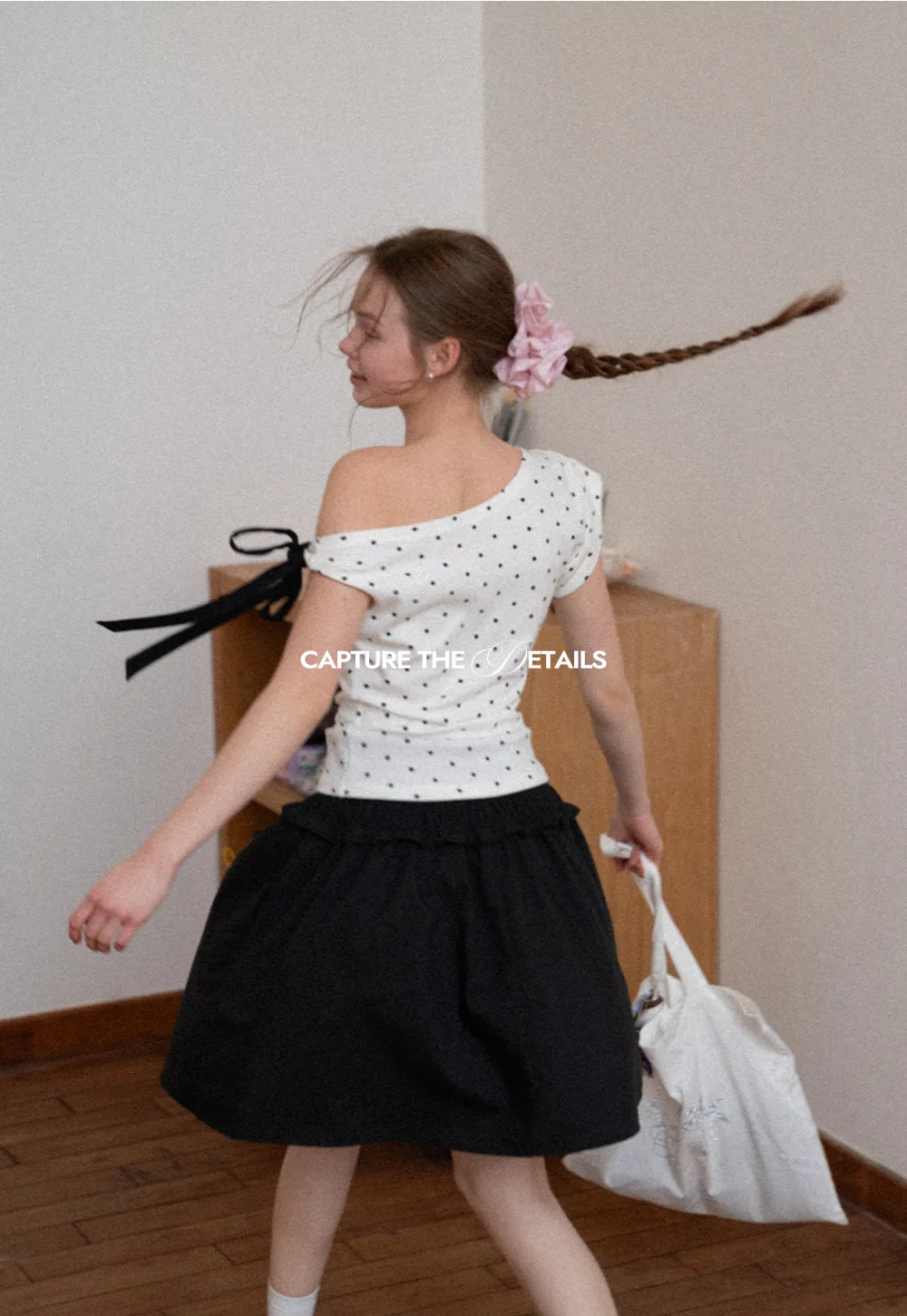 Polka dot one shoulder top with bow detail