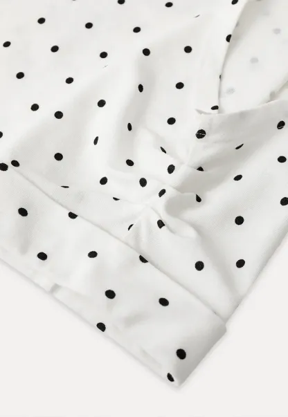 Polka dot one shoulder top with bow detail