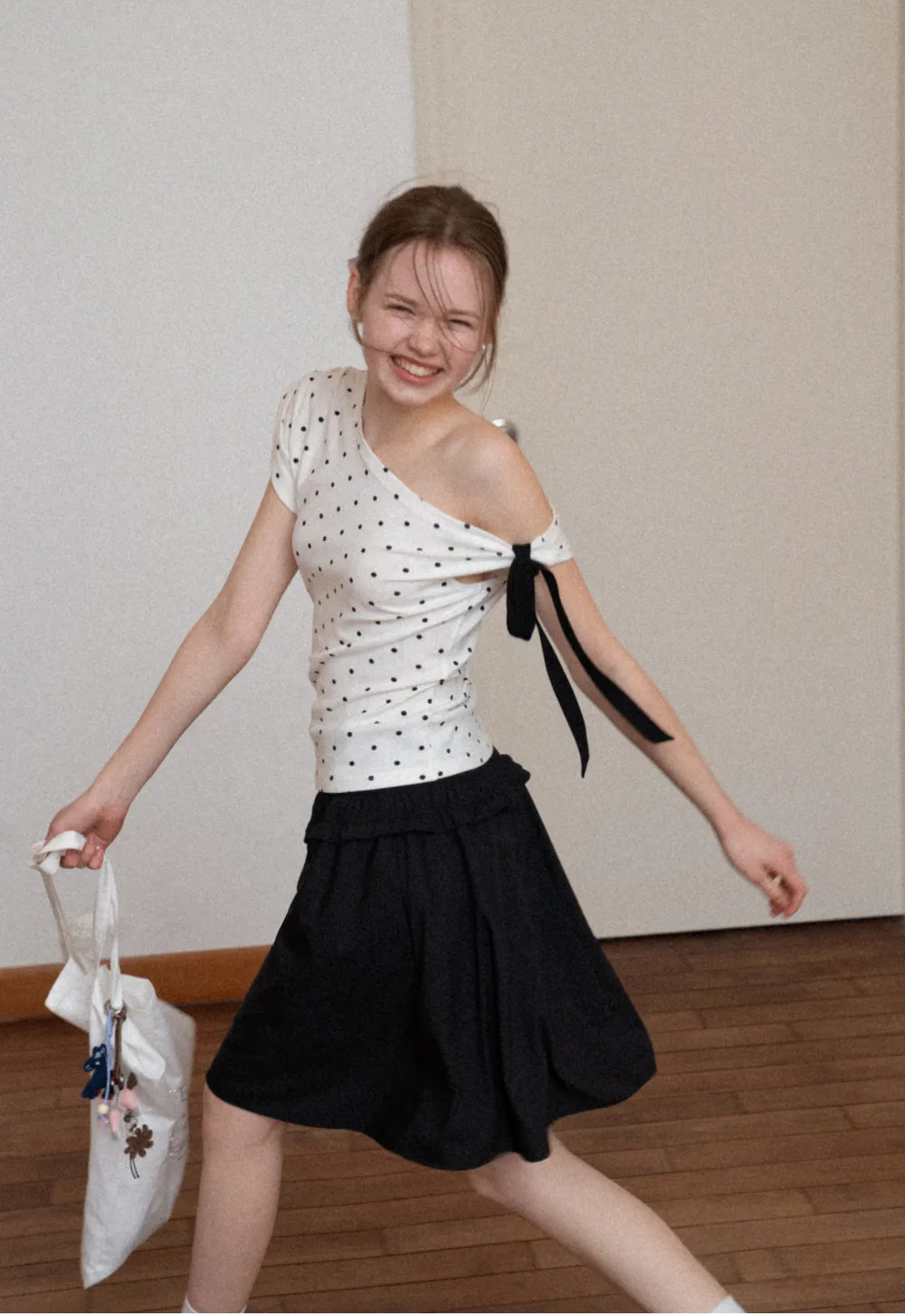 Polka dot one shoulder top with bow detail