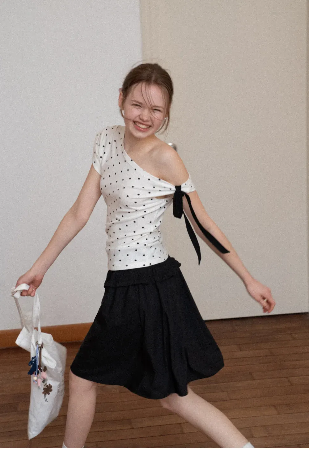 Polka dot one shoulder top with bow detail