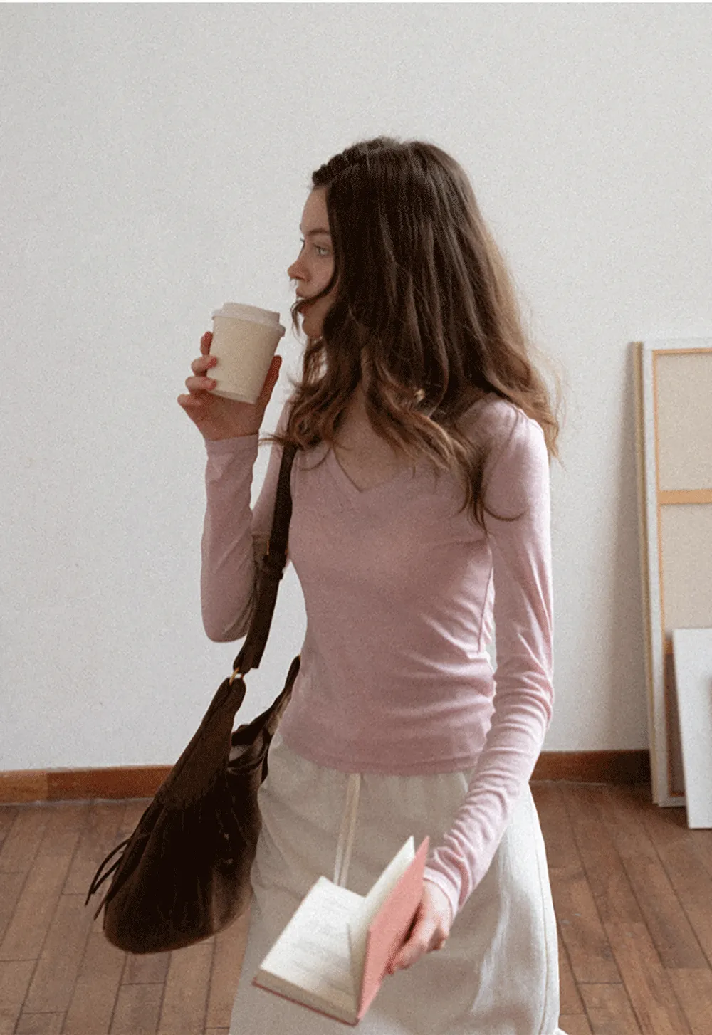 Long sleeve V neck T shirt with layered neckline