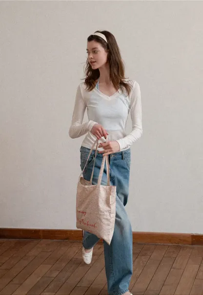 Long sleeve V neck T shirt with layered neckline