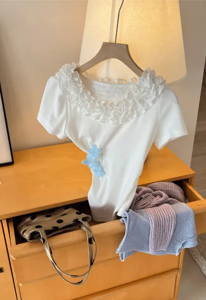 Short sleeve knit top with ruffled neckline