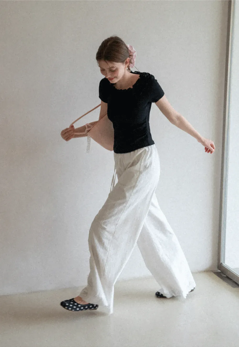 Short sleeve knit top with ruffled neckline