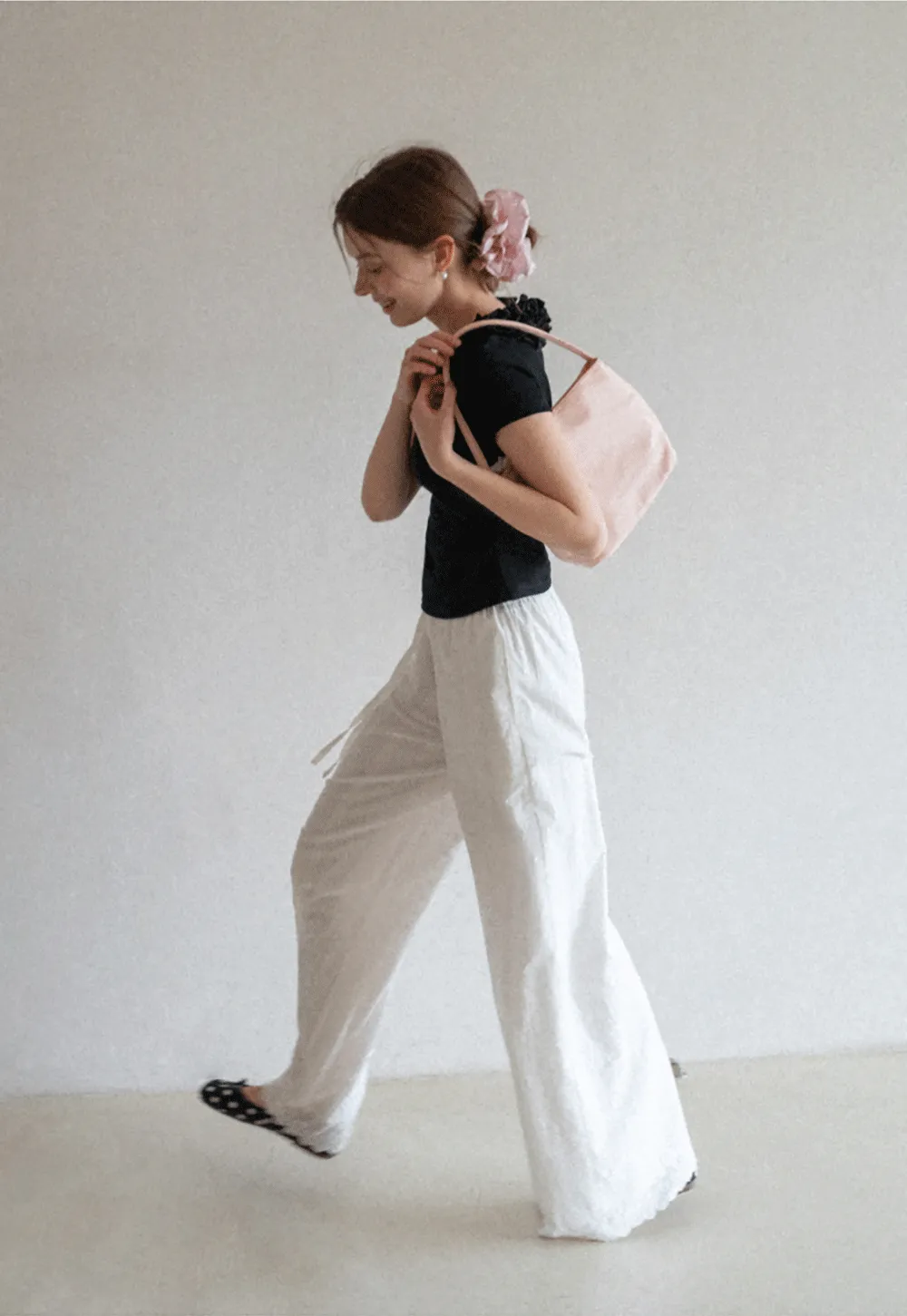 Short sleeve knit top with ruffled neckline