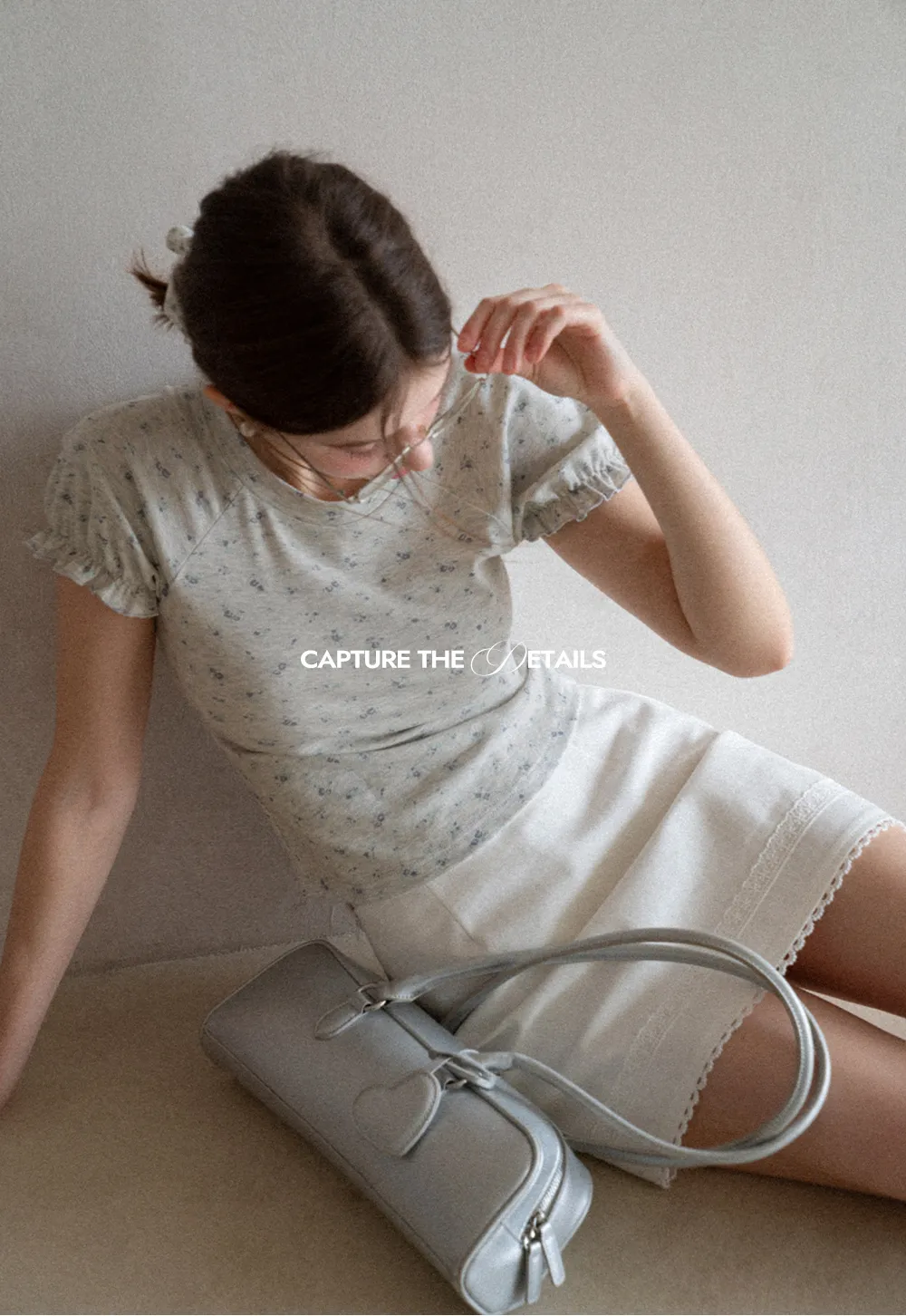 Short sleeve T-shirt with floral print and ruffled cuffs