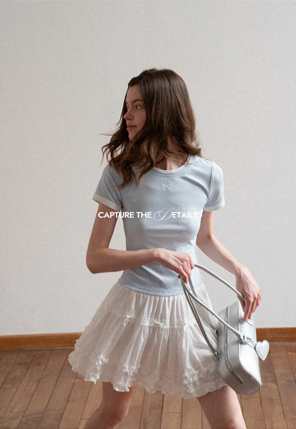 Short sleeve tshirt with embroidered bow detail