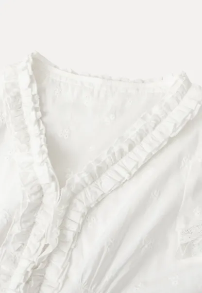 Embroidered short sleeve top with ruffled V neck and lace trim