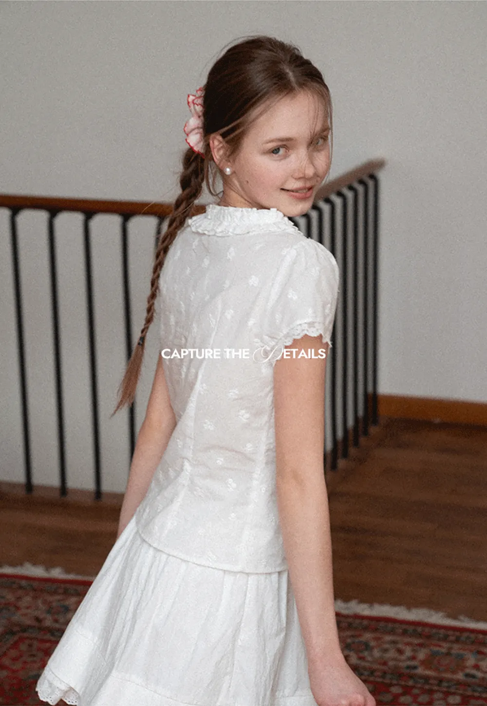 Embroidered short sleeve top with ruffled V neck and lace trim