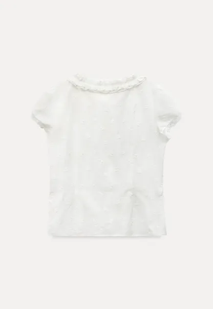 Embroidered short sleeve top with ruffled V neck and lace trim