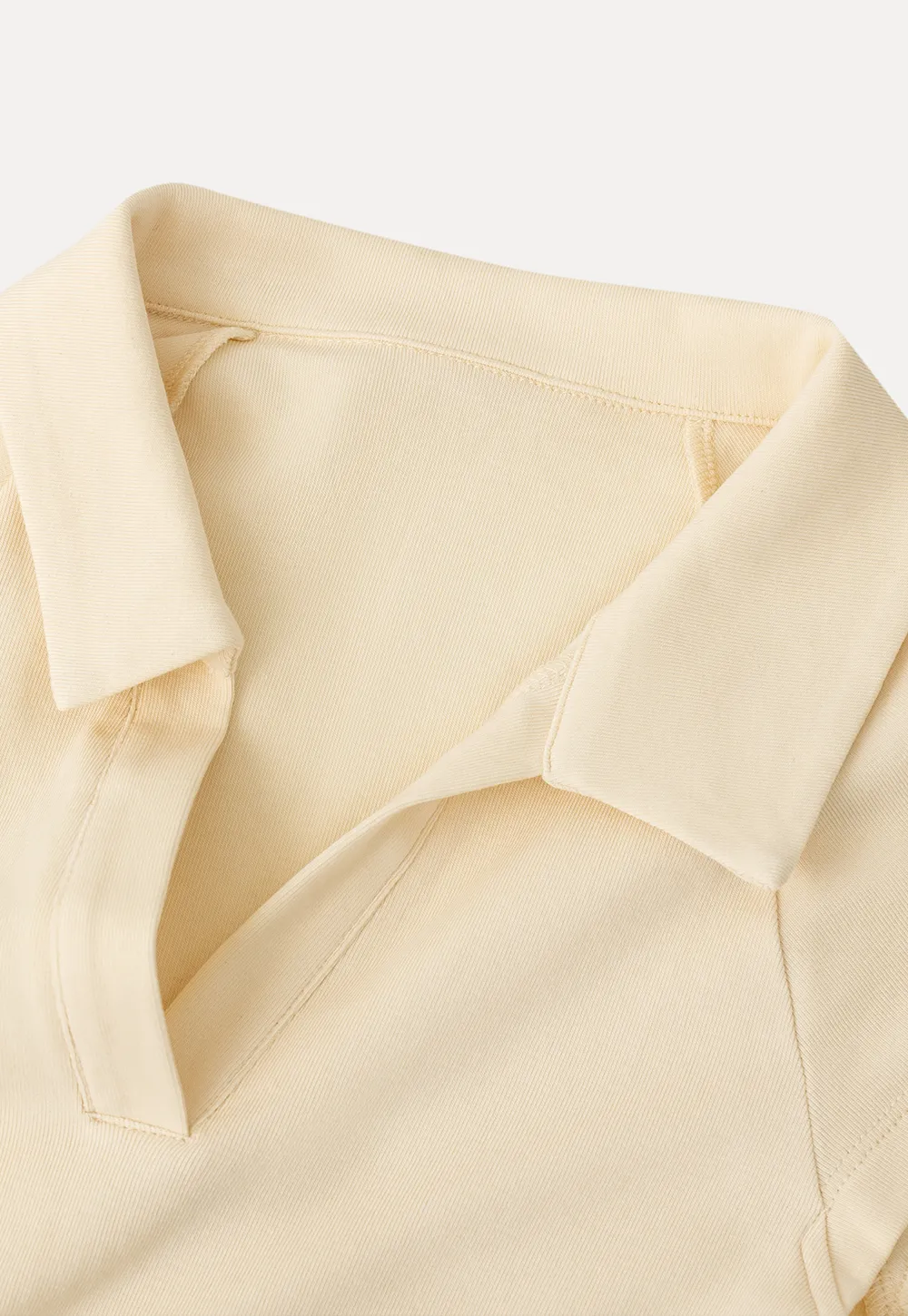 Sleeveless polo neck knit top