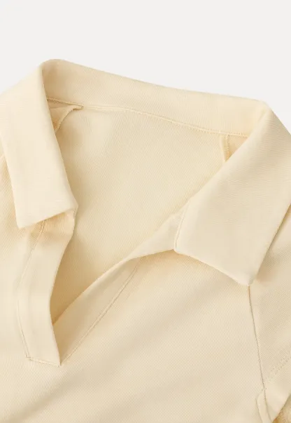 Sleeveless polo neck knit top