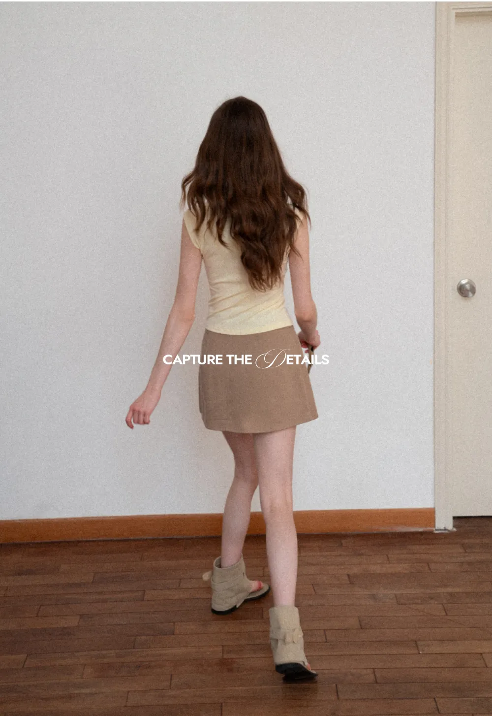 Sleeveless polo neck knit top