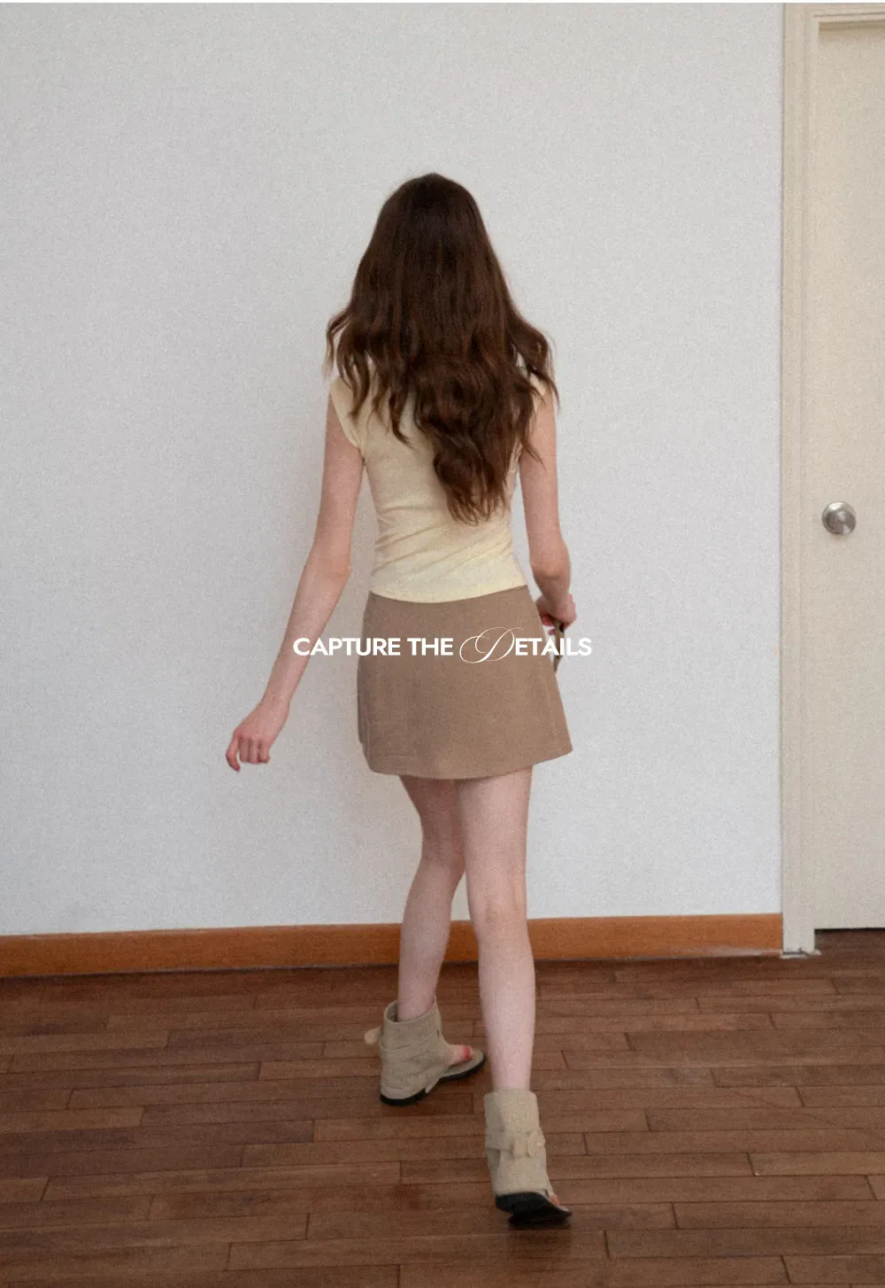 Sleeveless polo neck knit top