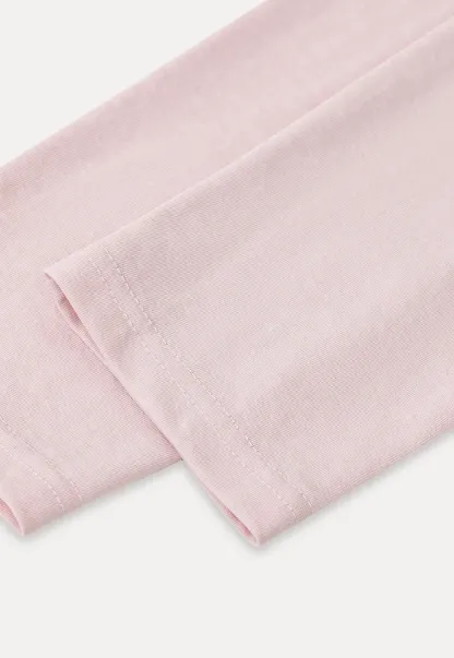 Haut en tricot à manches longues dénudées avec détail de nœud sur le côté