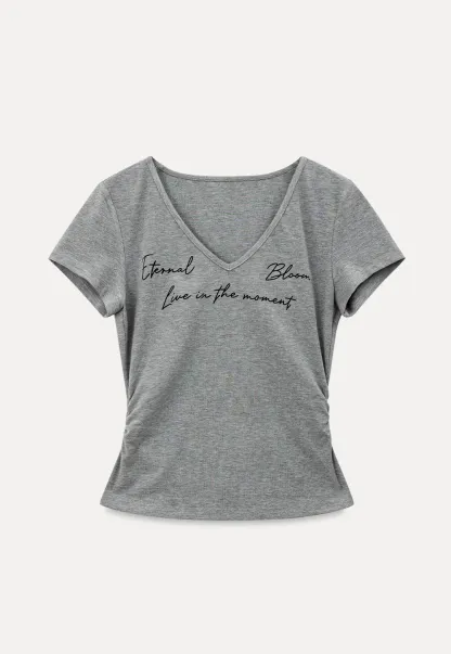 T-shirt à col en V, manches courtes et imprimé graphique