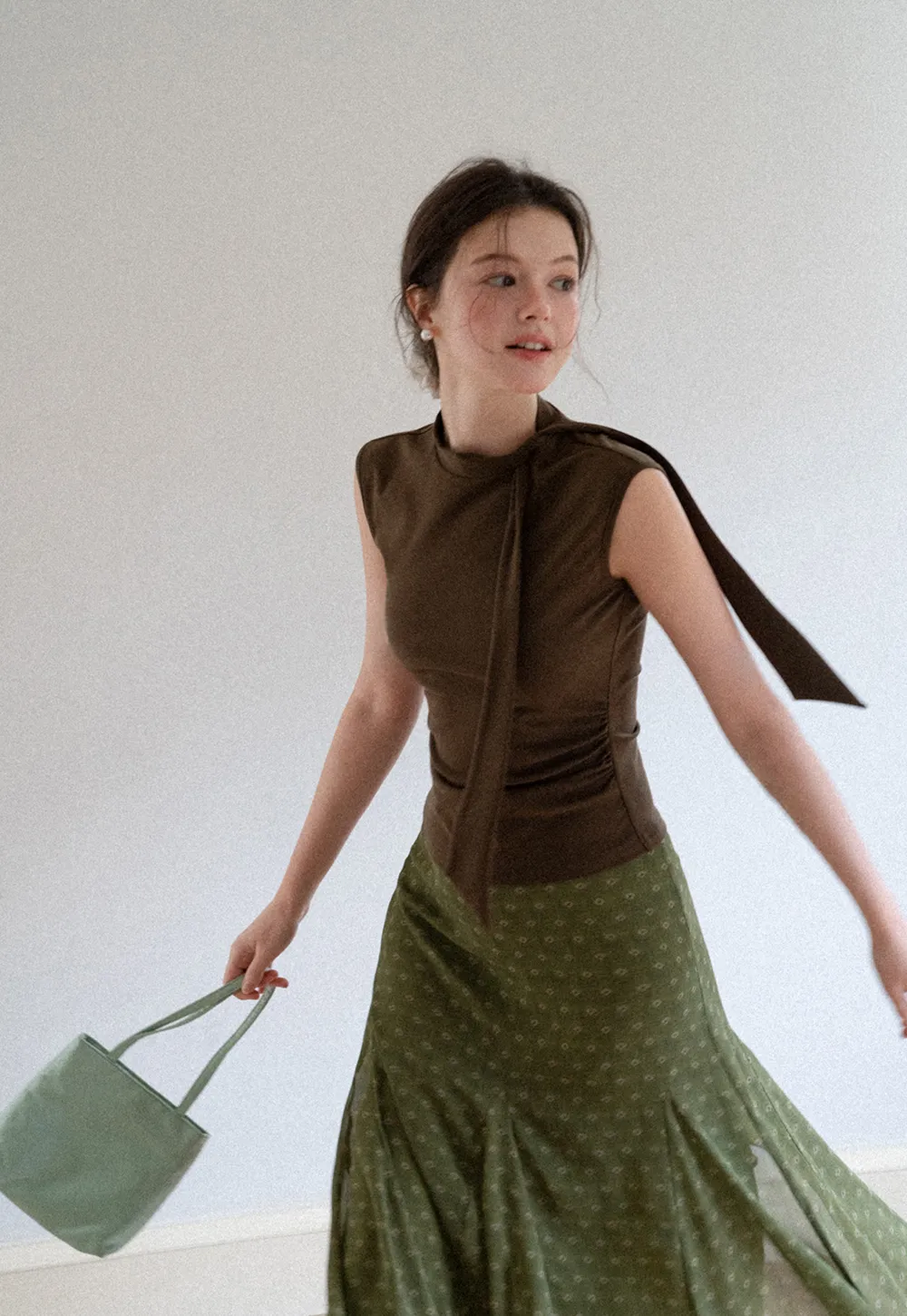 Asymmetrical Tie Neck Sleeveless Top